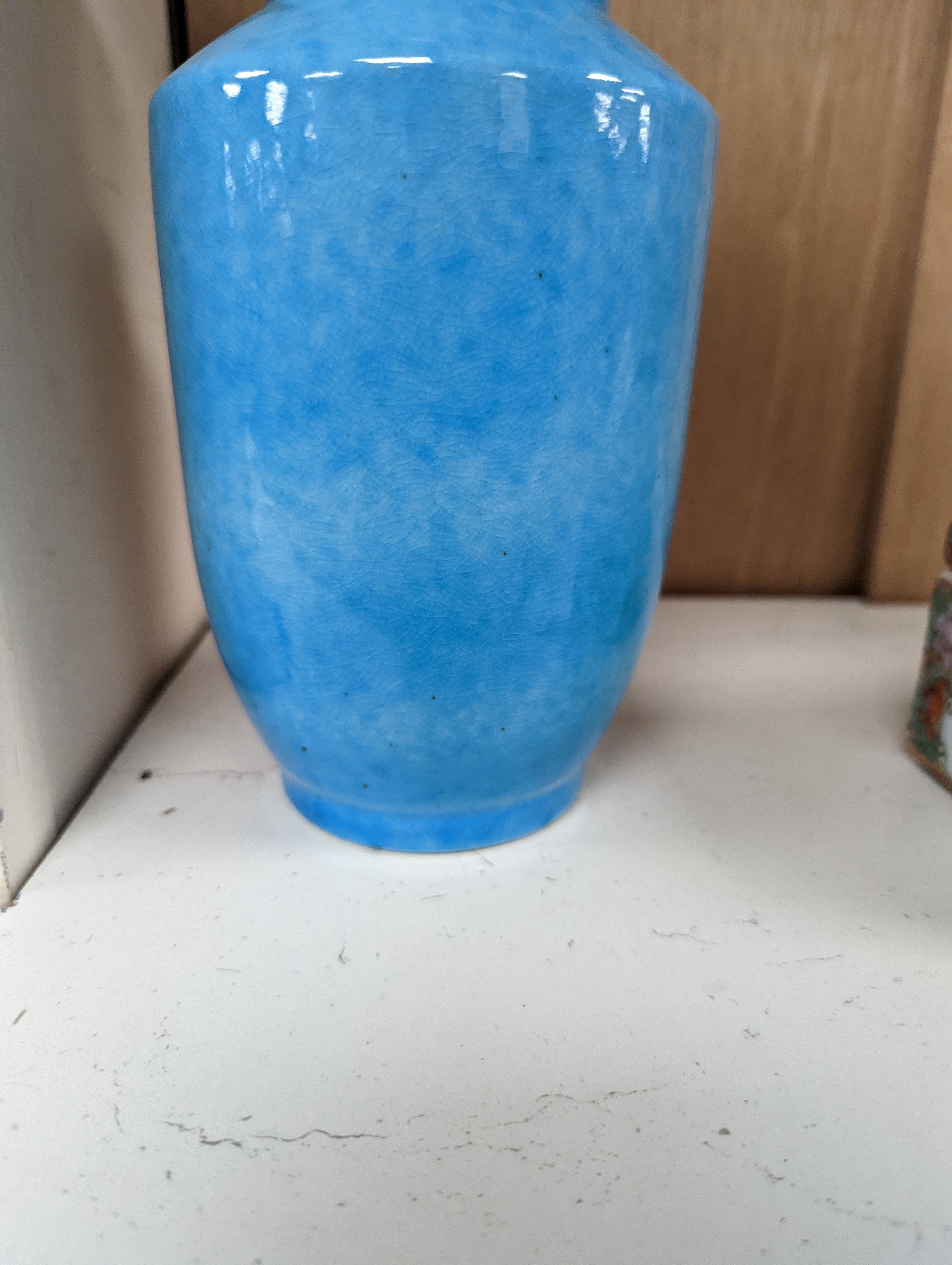 A Chinese turquoise glazed vase 22cm, with a fine crackle to the exterior glaze